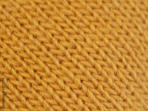 a set of warm yellow clothes. hat mittens and scarf