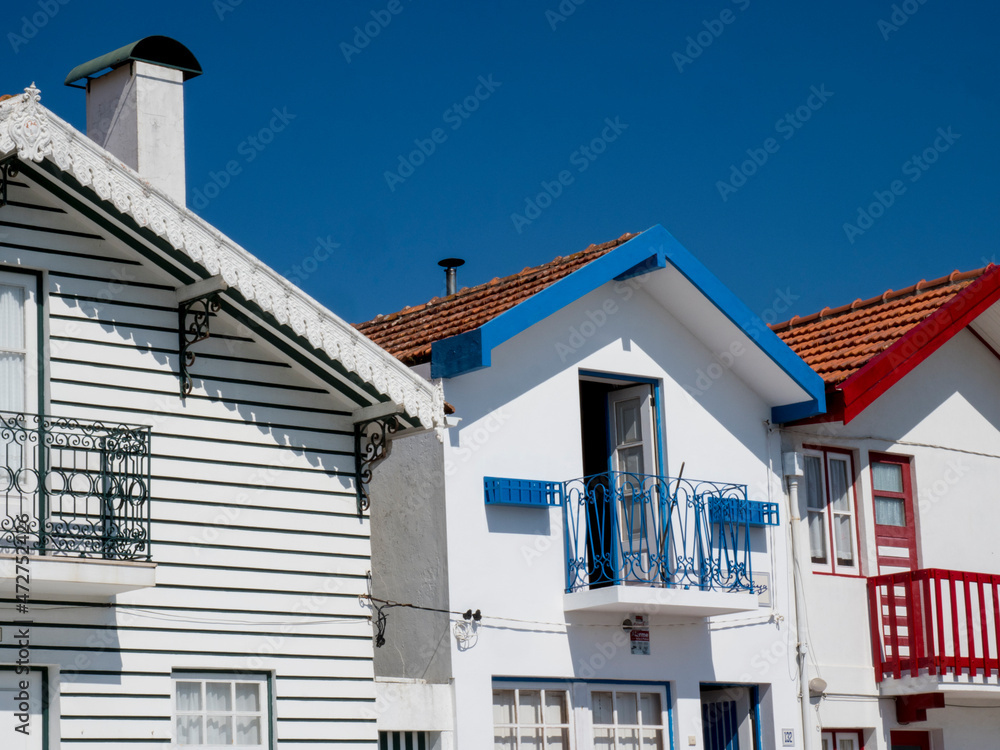 Portugal, Costa Nova. Colorful houses Palheiros striped homes