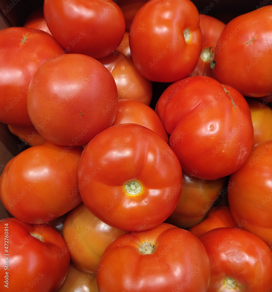a lot of red tomatoes close up a lot of red tomatoes close up