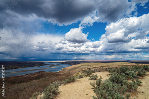 Storm clouds hover over the Columbia River in the Saddle Mountain National Wildlife Refuge in Washington, USA