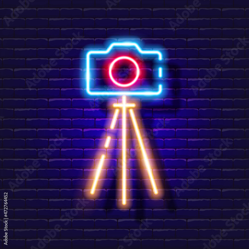 Tripod camera neon icon. Photo and video concept. Vector illustration of a sign for design, website, decoration, online store.