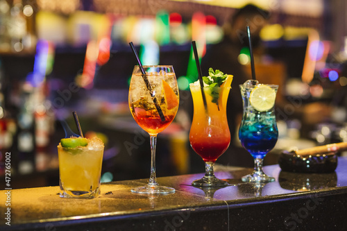 Cocktails set on a bar at Casino. Cocktails assortment.