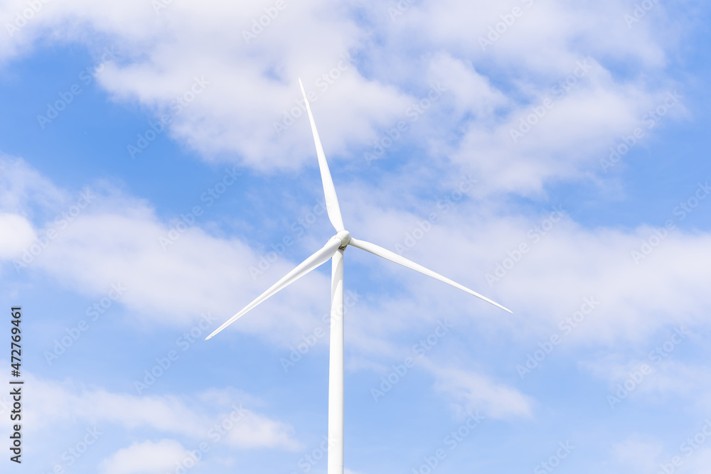 Wind turbines of global ecology with cloud background on the sky. alternative electricity source to be sustainable resources in the future. Clean energy concept saves the world Wind turbines of global ecology with cloud background on the sky. alternative electricity source to be sustainable resources in the future. Clean energy concept saves the world