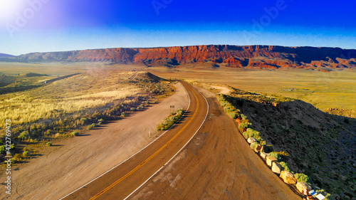 Aerial view of beautiful road corssing the canyon in summer season