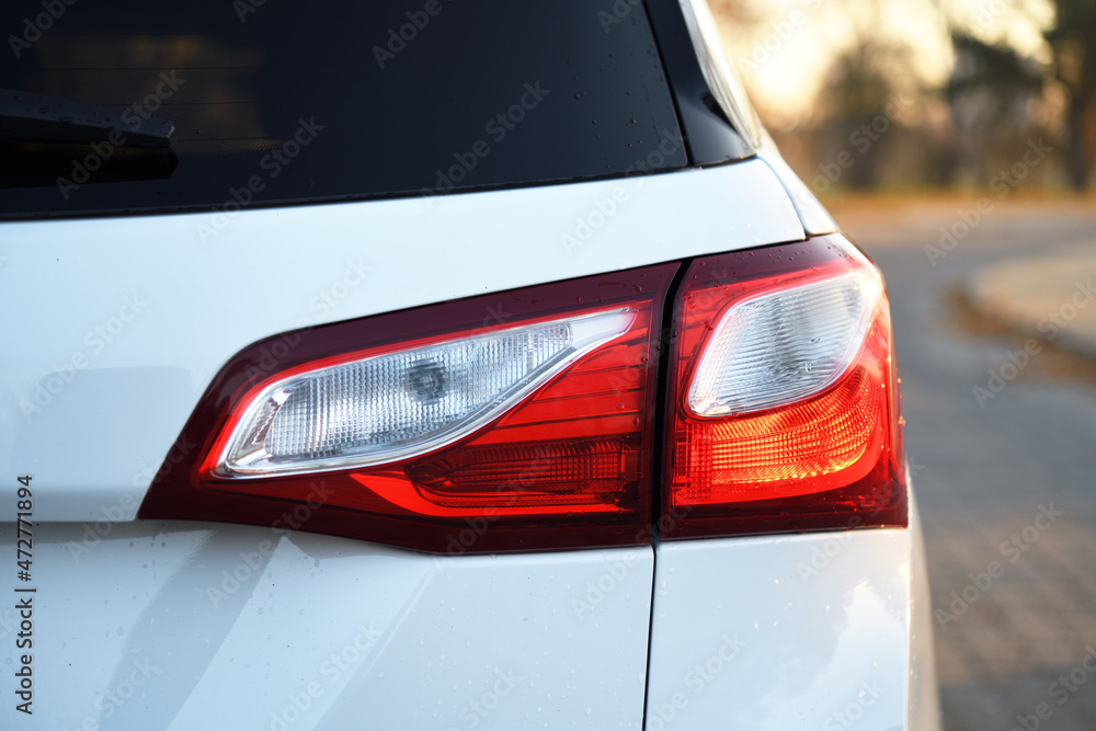 Modern rear light of a car. Brake light and arrow of large suv.