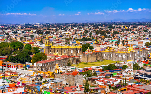 Colorful church Cityscape, Cholula, Puebla, Mexico. church built 1500's and 1600's. Cholula had 365 church with very small population. photo