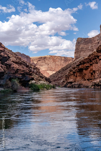 USA, Arizona. Floating down the Colorado River with canyon walls and clouds, Grand Canyon National Park. © Danita Delimont
