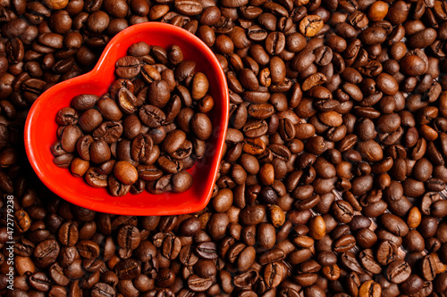 Selective focus on heart with coffee beans. Good morning coffee lover. Close up