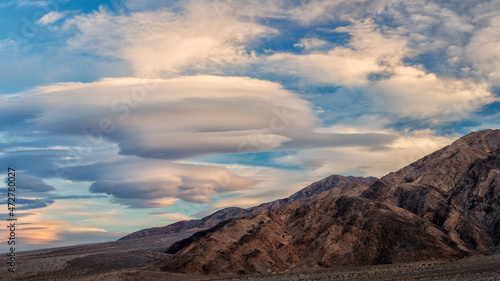 USA, California, Death Valley National Park, Panorama of lenticular clouds at sunset