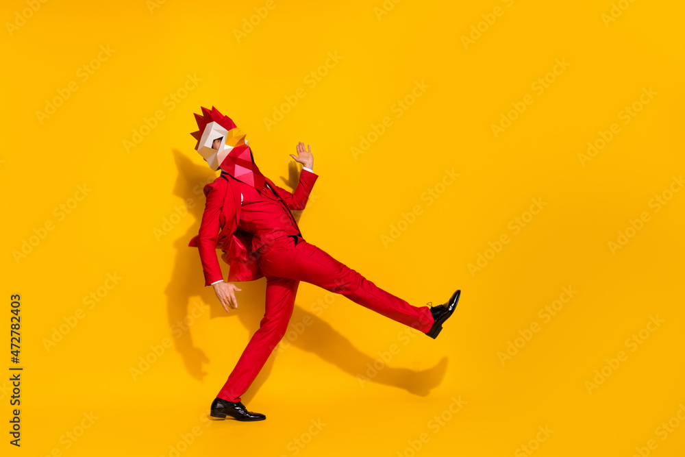 Profile photo of disco entertainer dance have fun wear rooster polygonal mask red tux isolated yellow color background