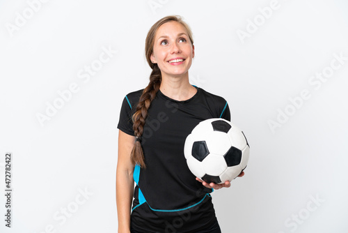 Young football player woman isolated on white background thinking an idea while looking up © luismolinero