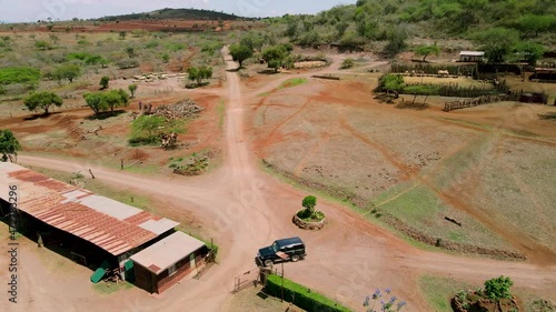 Drone tracking a car in the deep of savanna of Africa south kenya. Mavic Air 2 drone footage tracking a car.  Rural roads with the drone tracking a car in the savanna. Climate change photo