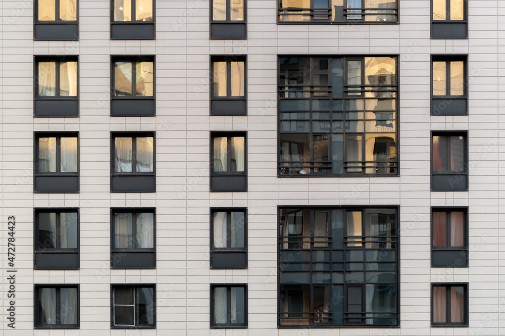 pattern from the windows of a multi-storey residential building