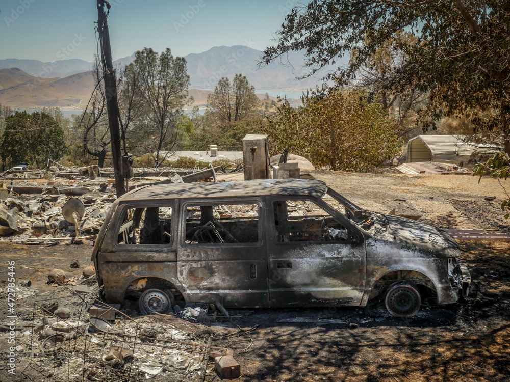 Remains of house after wildfire in Southern Sierra Nevada Mountains, from drought stressed forest Remains of house after wildfire in Southern Sierra Nevada Mountains, from drought stressed forest