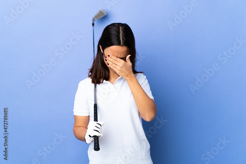 Young golfer woman over isolated colorful background with tired and sick expression