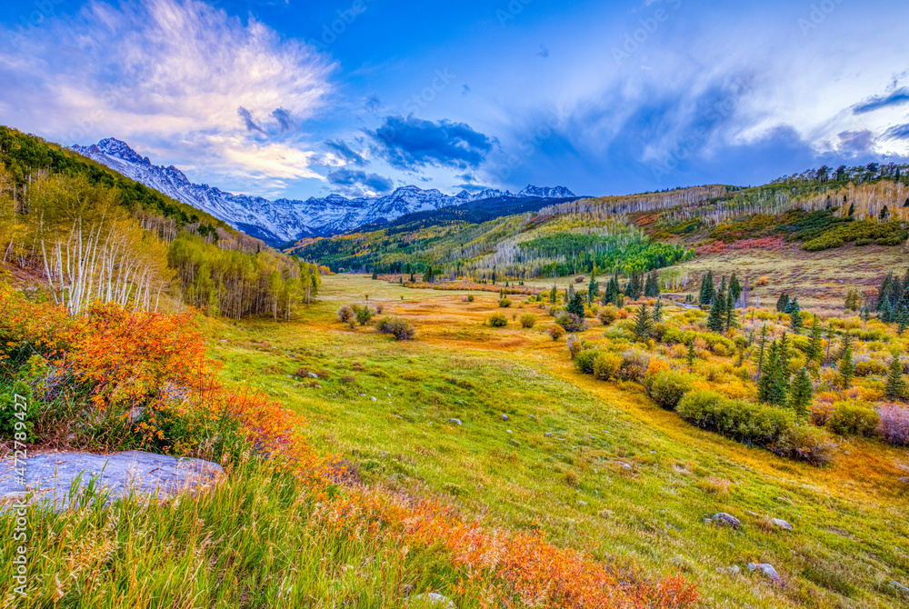 USA, Colorado, Sneffels Range. Sunset on mountain and valley autumn landscape.