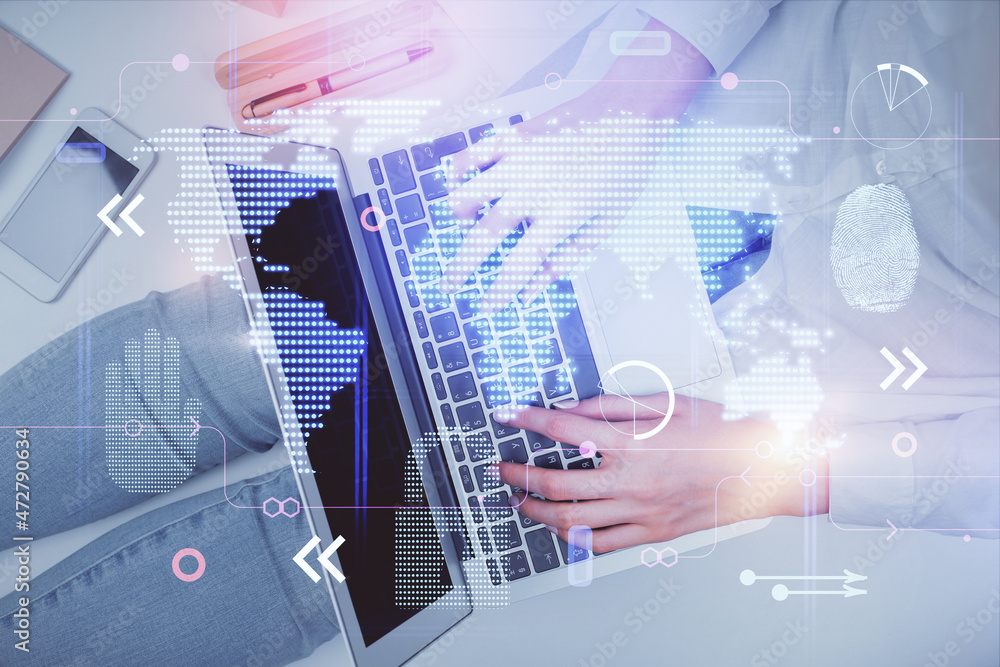 Double exposure of woman hands working on computer and world map hologram drawing. Top View. International business concept. Double exposure of woman hands working on computer and world map hologram drawing. Top View. International business concept.