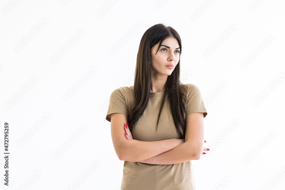 Smiling woman with folded hands against white background. T Smiling woman with folded hands against white background. T