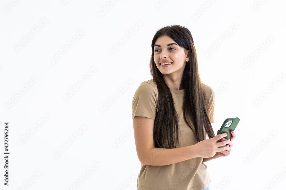 Portrait Of Young Woman using Phone Isolated On White Background Portrait Of Young Woman using Phone Isolated On White Background