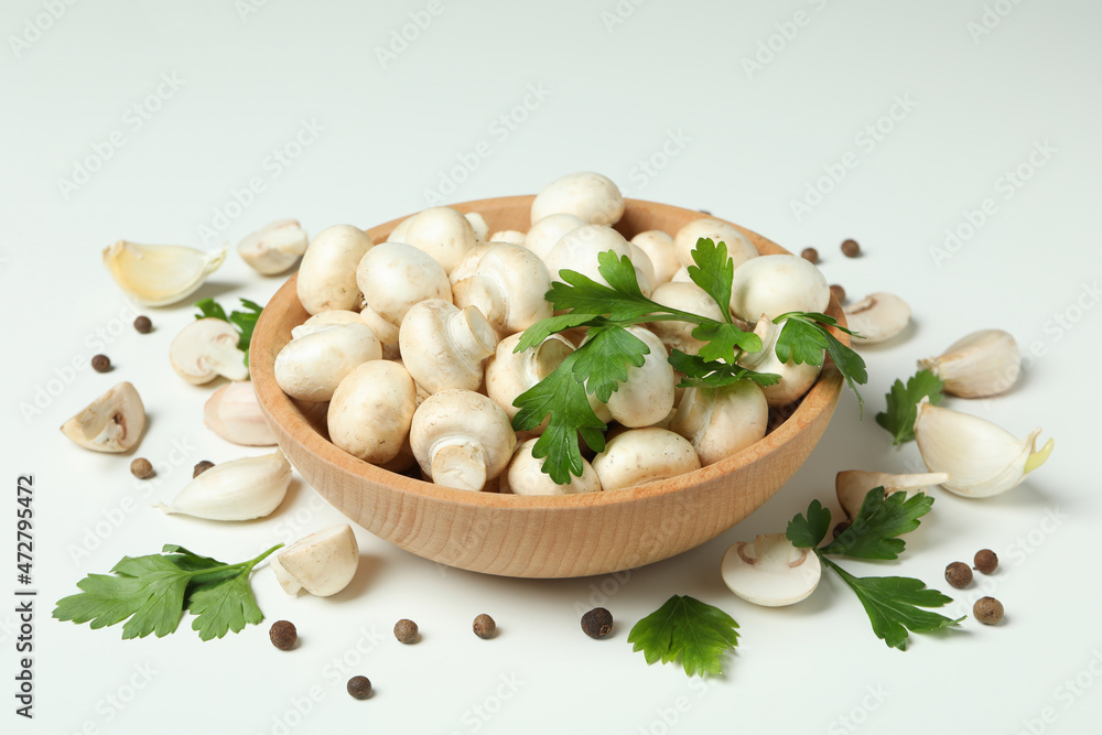 Concept of tasty food with champignon on white Concept of tasty food with champignon on white
