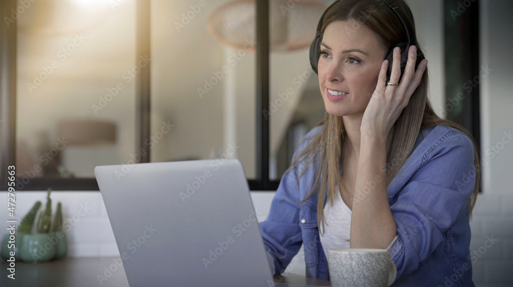 young woman working on her laptop at home young woman working on her laptop at home