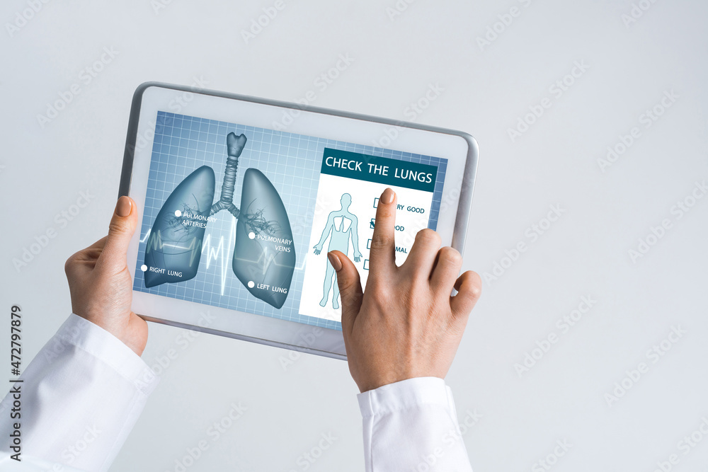 Close of female doctor hands working with tablet pc computer Close of female doctor hands working with tablet pc computer