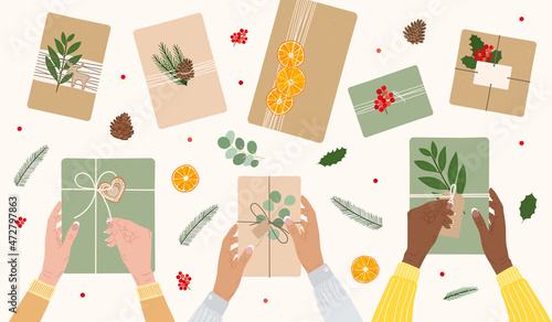 Diversity female hands hold gift boxes wrapped into kraft paper. Top view eco-friendly packaging, dry orange, red berries, pine cones. Eco Christmas concept. Hand drawn vector illustration