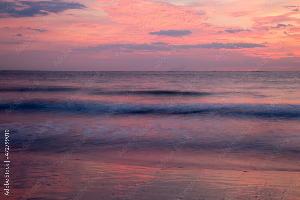 USA, Georgia, Tybee Island. Colorful pink sunrise at Tybee Beach.