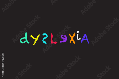 dyslexia spelled in coloured chalk letters on a blackboard