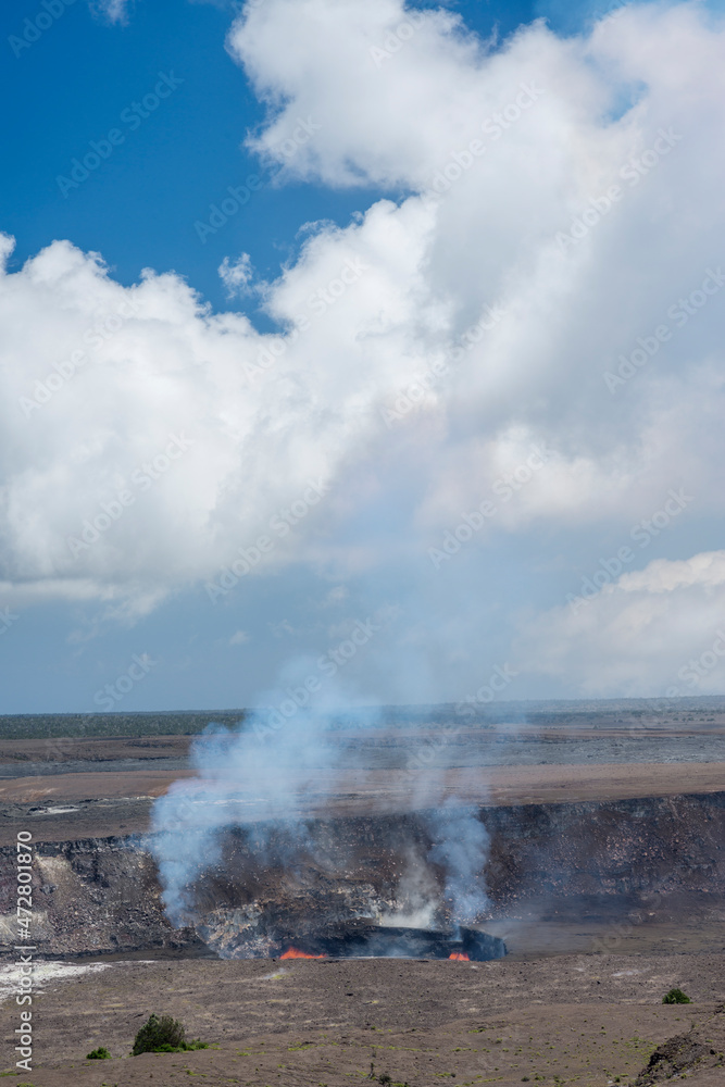 USA, Hawaii, Big Island of Hawaii. Hawaii Volcanoes National Park, Lava and steam eruption in Halemaumau Crater which is located within Kilauea Crater.