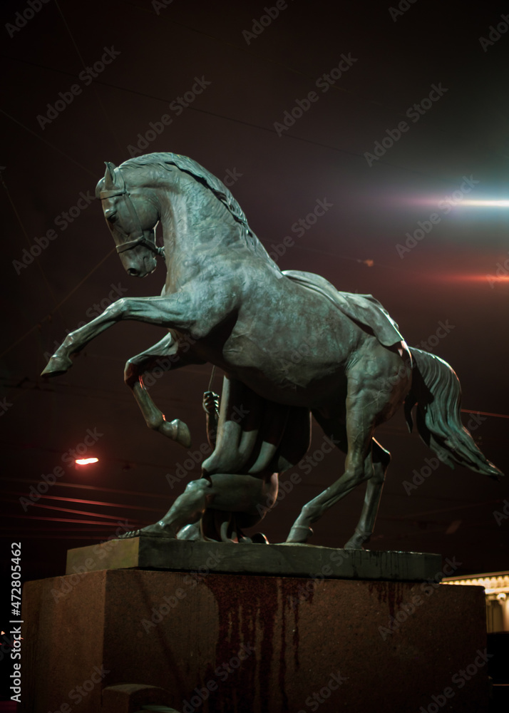 Sculpture of a horse on the famous Anichkov Bridge in St. Petersburg