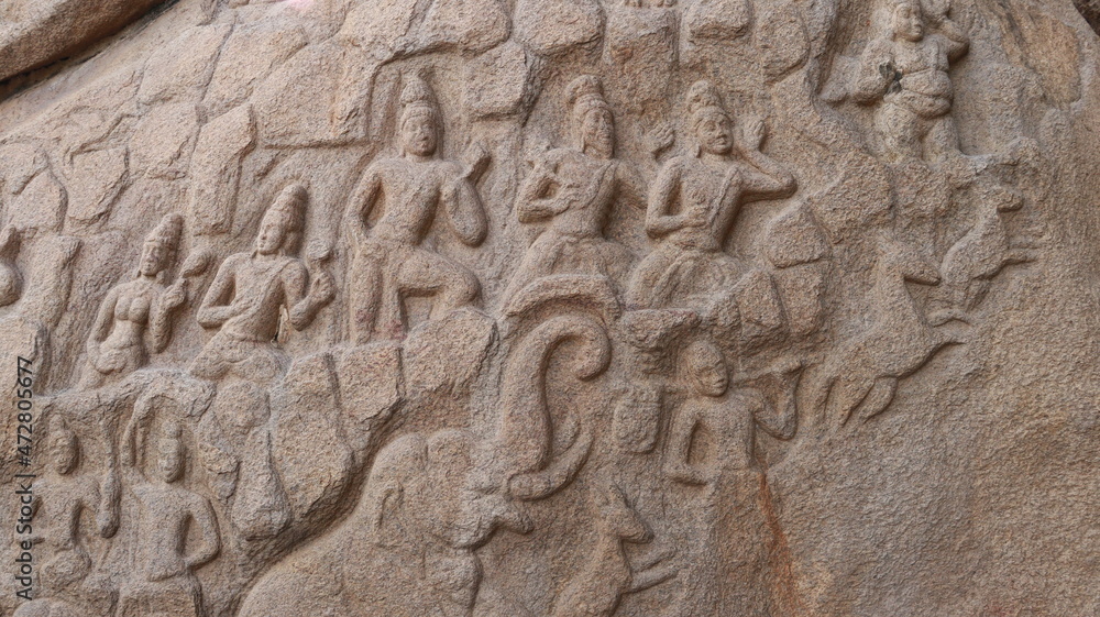 Sculptures carved in rock. The rock is located in the background