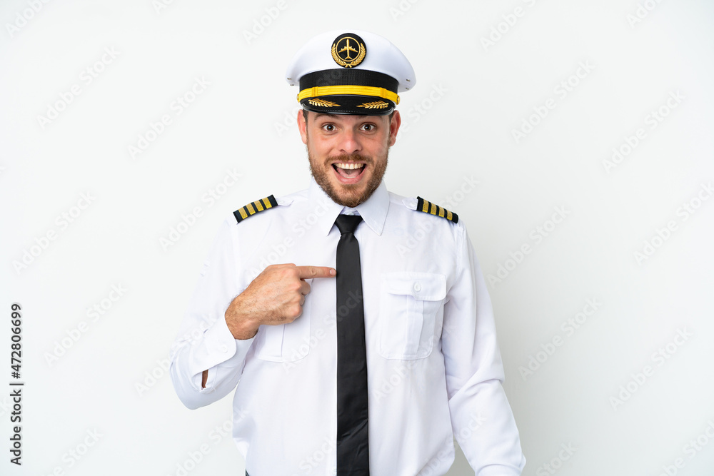Airplane Brazilian pilot isolated on white background with surprise facial expression Airplane Brazilian pilot isolated on white background with surprise facial expression