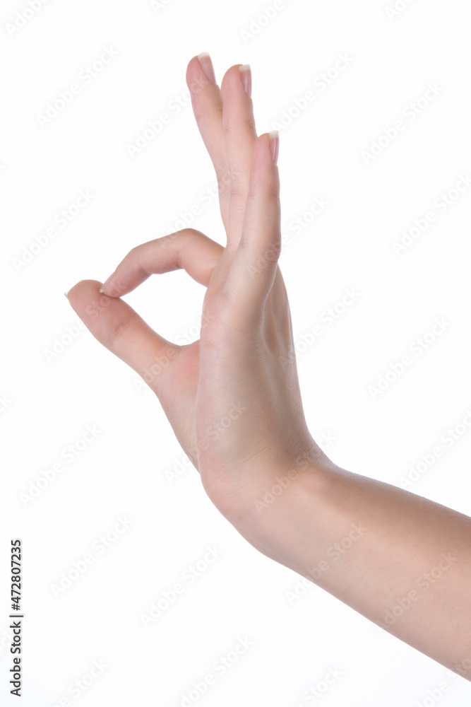 Woman hand making ok gesture Woman hand making ok gesture