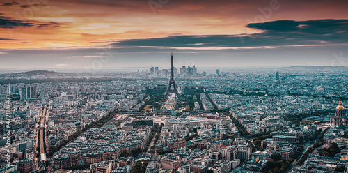 aerial view over Paris at sunset with iconic Eiffel tower © Melinda Nagy