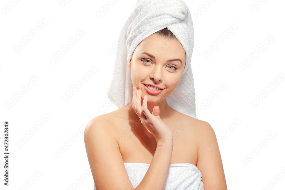 Skin care. Portrait of beautiful young shirtless caucasian woman holding fingers on cheek and looking at camera while isolated on white background. Skin care. Portrait of beautiful young shirtless caucasian woman holding fingers on cheek and looking at camera while isolated on white background.