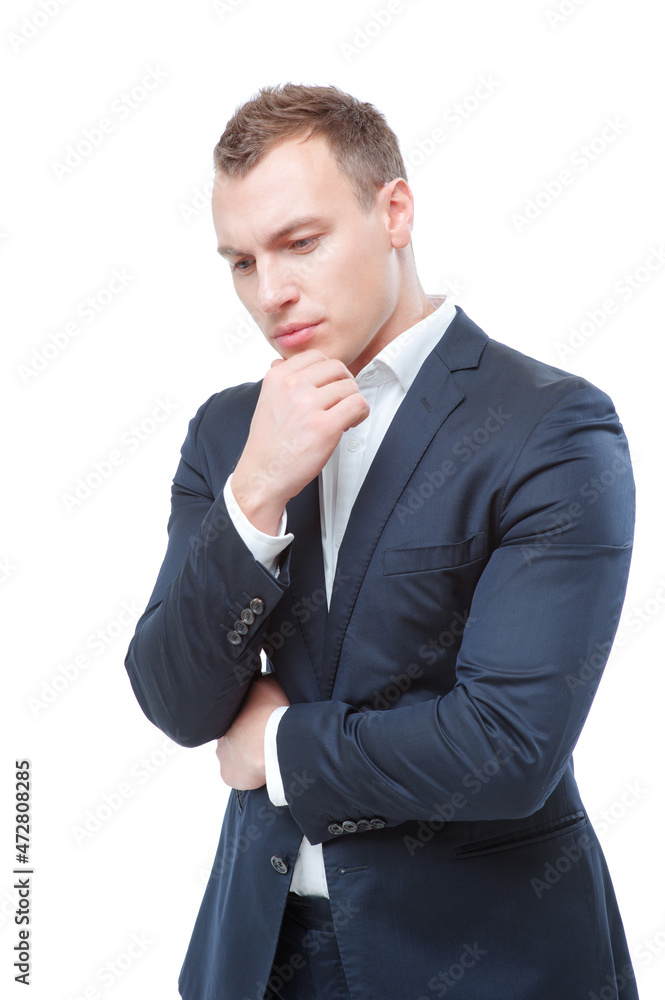 Thinking about solutions. Thoughtful young man in formal wear holding hand on chin and looking away isolated on white. Thinking about solutions. Thoughtful young man in formal wear holding hand on chin and looking away isolated on white.