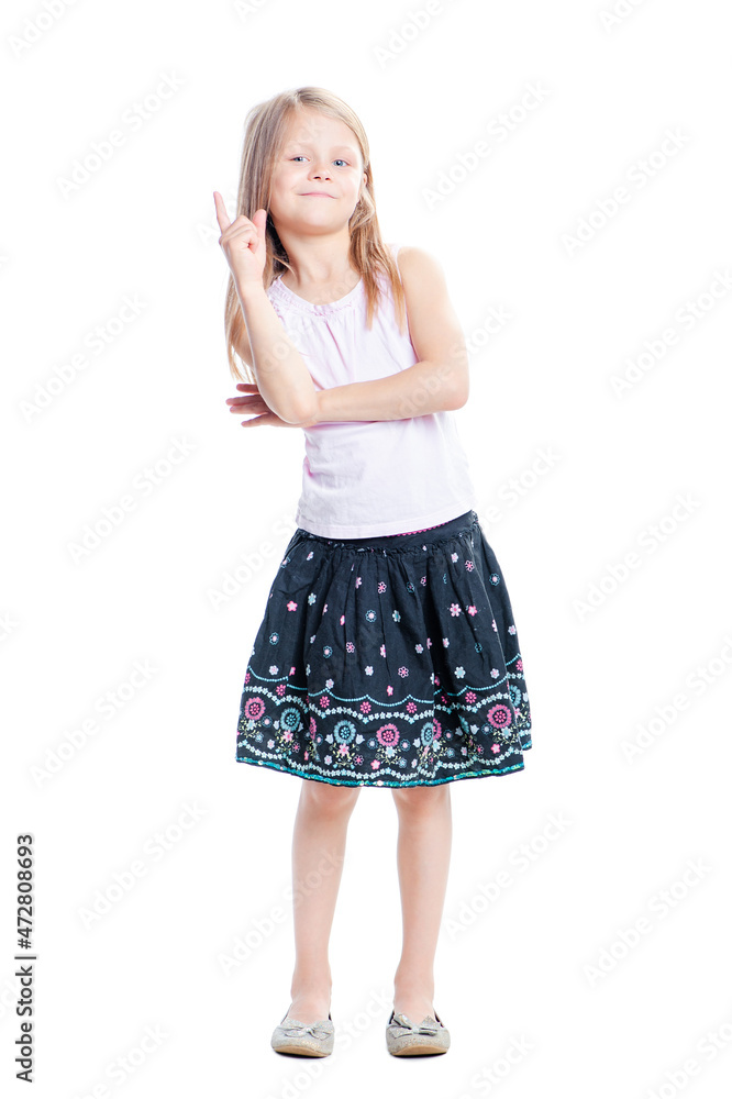 Fototapeta premium I got idea! Full length of thoughtful little girl pointing up. Isolated on white.