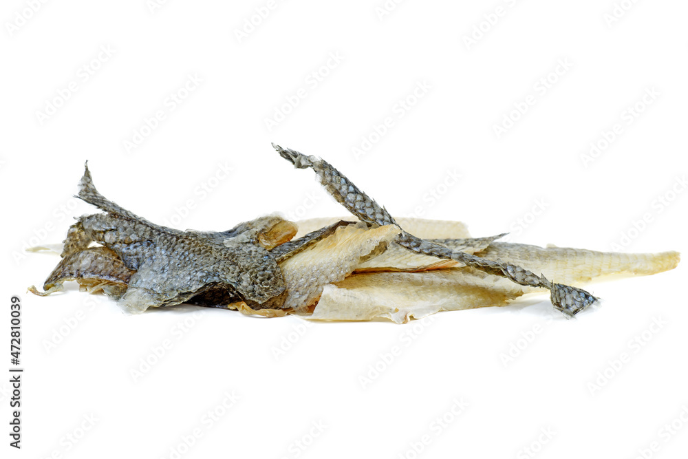 Pieces of fish skin scales isolated on a white background