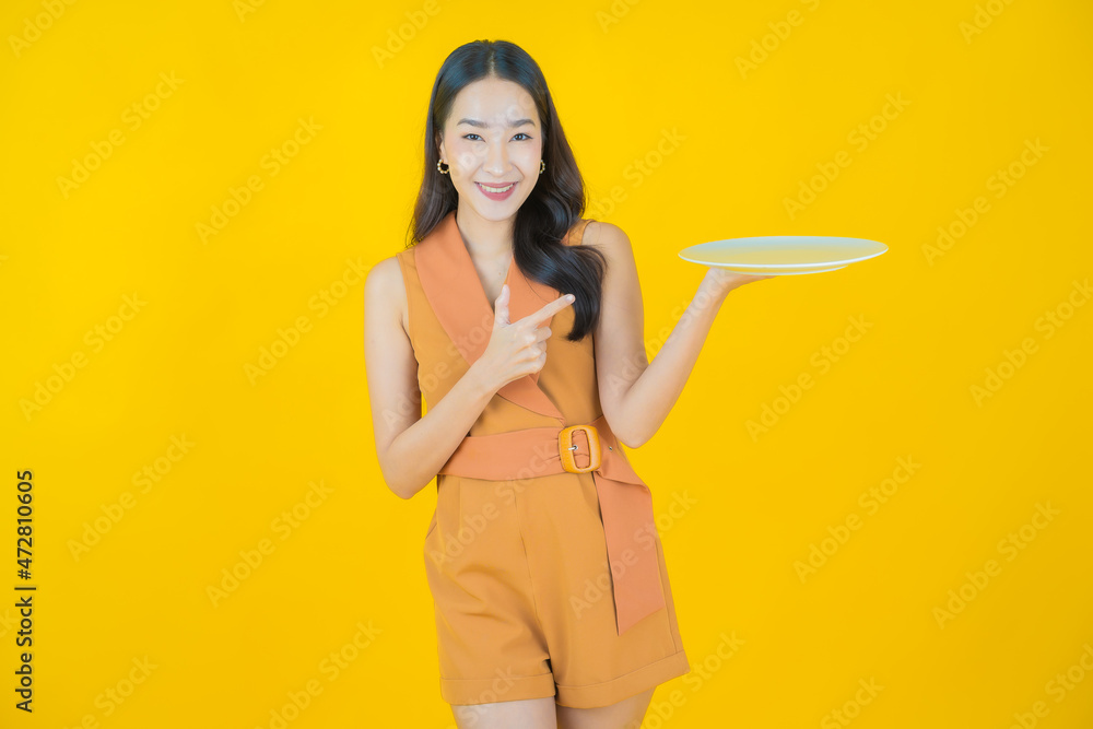 Portrait beautiful young asian woman smile with empty plate dish Portrait beautiful young asian woman smile with empty plate dish