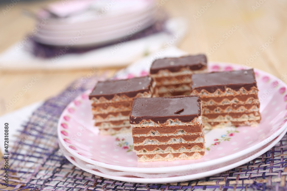Homemade waffle dessert with chocolate, biscuits and nuts Homemade waffle dessert with chocolate, biscuits and nuts