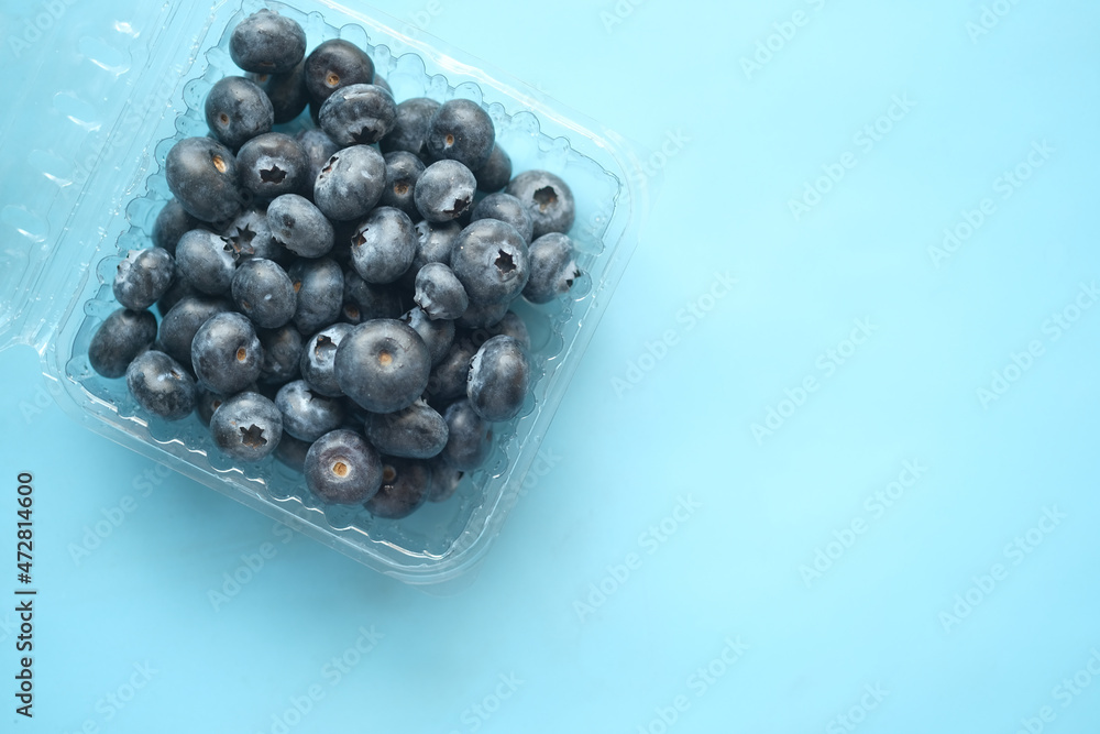 Close up of fresh blue berry with water drops . Close up of fresh blue berry with water drops .