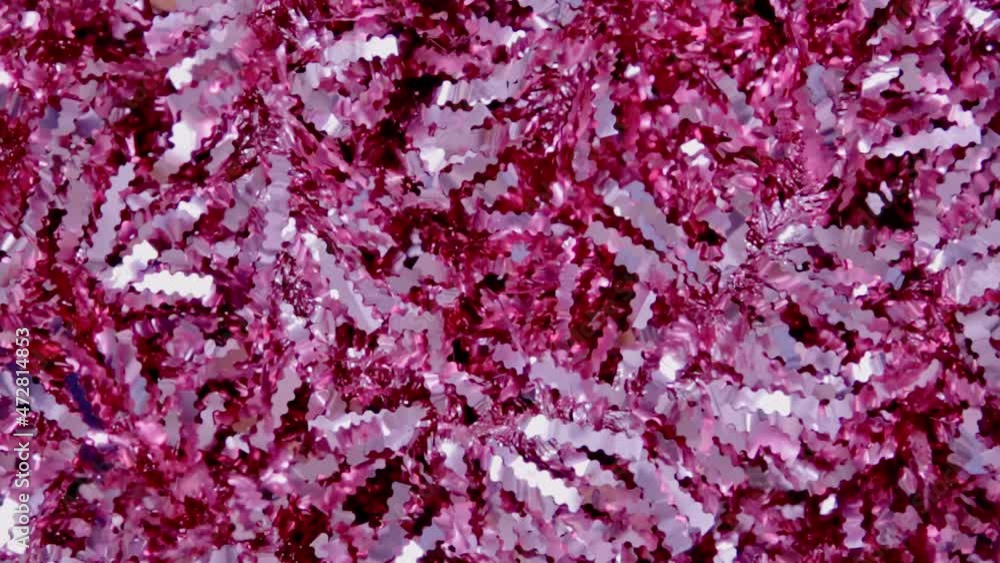 Pink shiny sparkling tinsel background Pink shiny sparkling tinsel background