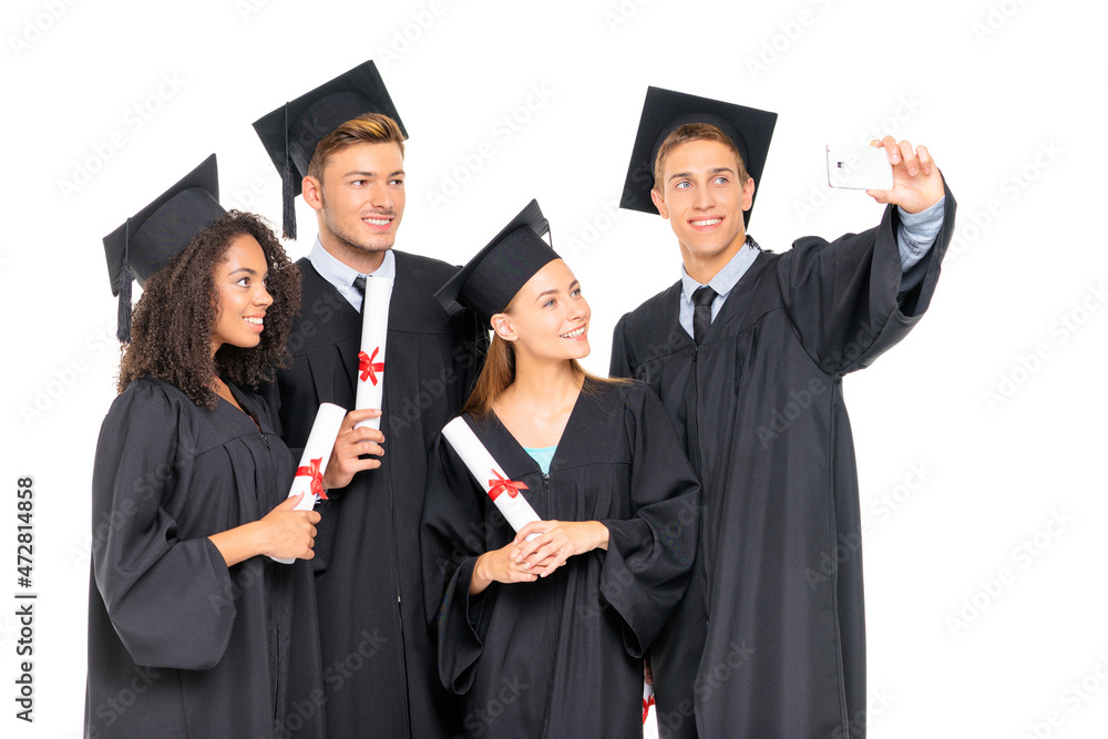 Happy graduates. Group of young attractive students taking selfie together. Isolated on white. Happy graduates. Group of young attractive students taking selfie together. Isolated on white.