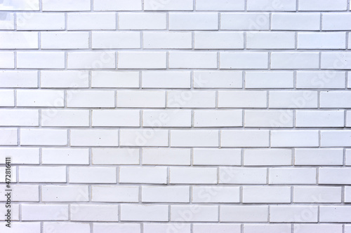 White brick wall textured background.