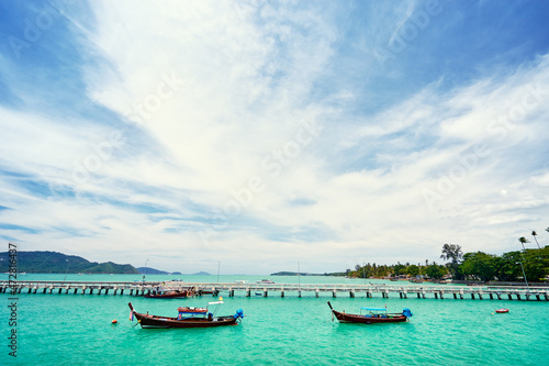 Travel by Thailand. Beautiful summer landscape with tropical sea marina lagoon and pier. © luengo_ua