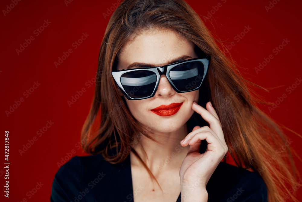 glamorous woman wearing sunglasses red lips posing close-up glamorous woman wearing sunglasses red lips posing close-up