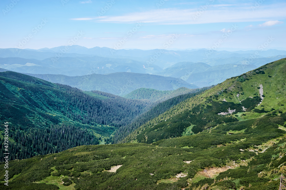 Beautiful mountains landscape with green meadow. Carpathians, Ukraine.