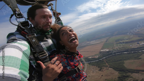Sky dive selfie couple at the skies