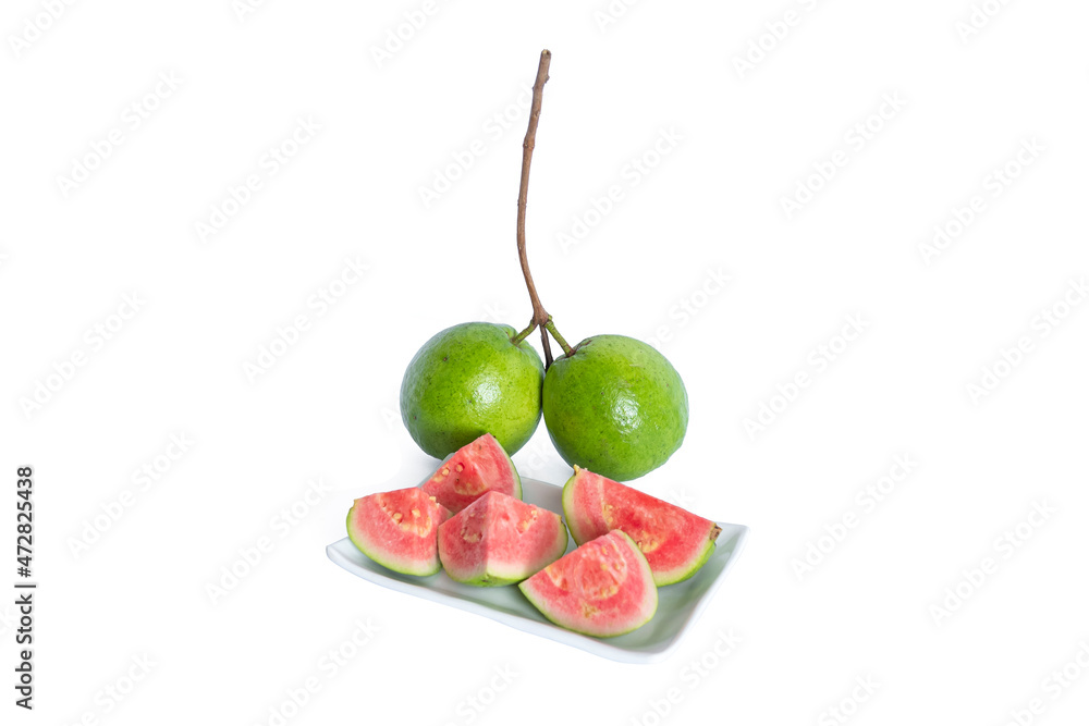Two Guava two Common guava and r Common guava cut into small pieces and served on ...